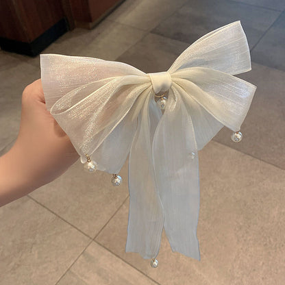 Streamer Pearl Bow Spring Hair Clip